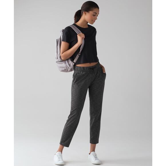 LULULEMON On The Fly Pant (28") Heathered Black Size 4 Pockets Athleisure Travel - Picture 1 of 9